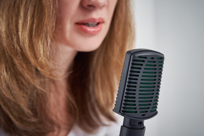 Academy of Acting Woman recording online podcast at home, podcasting concept